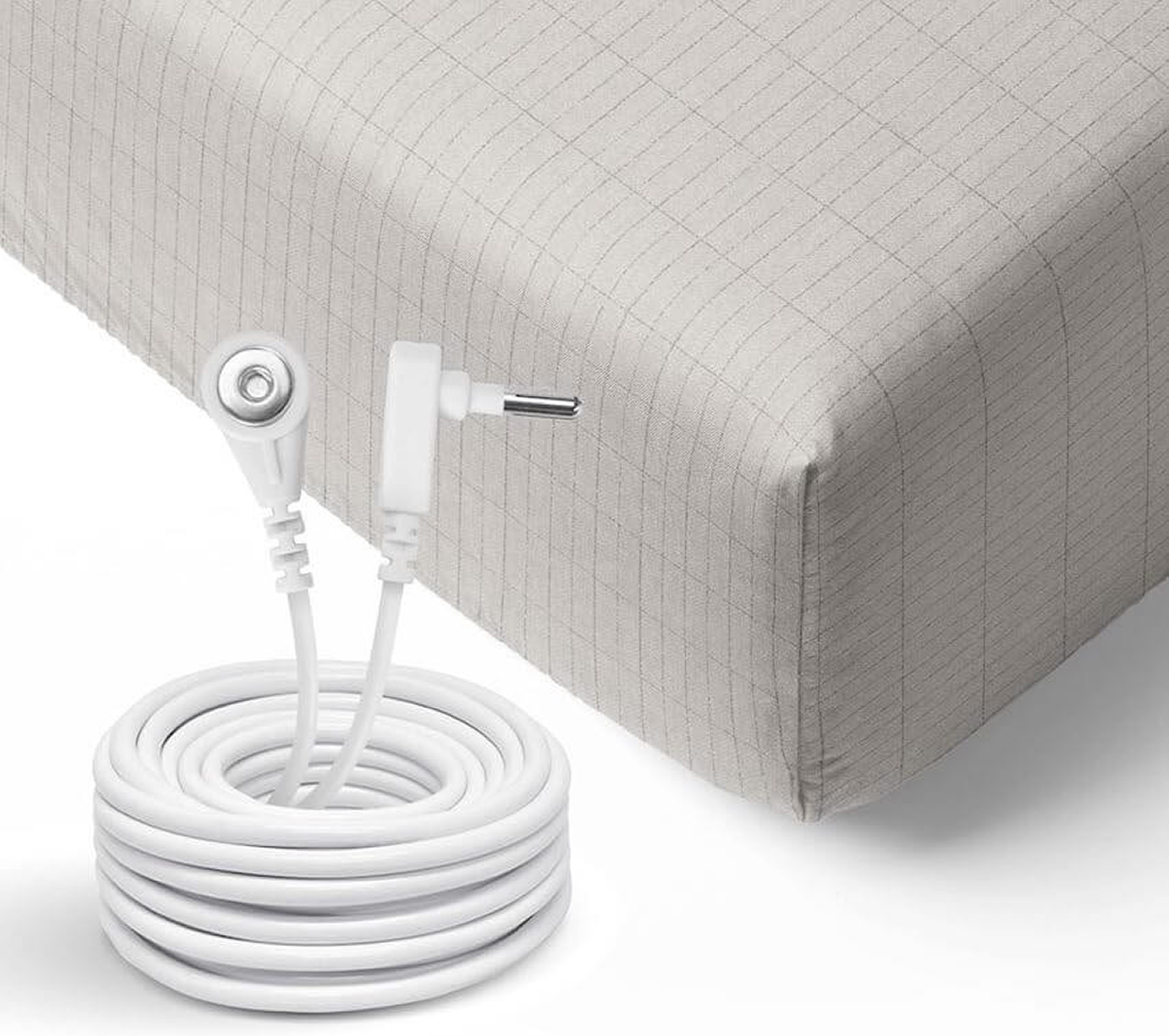 Close-up of Zenapura grounding sheet with silver thread fabric and connection cable for earth grounding bed sheets and EMF protection, showing fitted corner design.