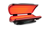 MaxiLUX Red Light Therapy Bed during a session, showing full-body red and near infrared light therapy for skin rejuvenation, pain relief, and muscle recovery.